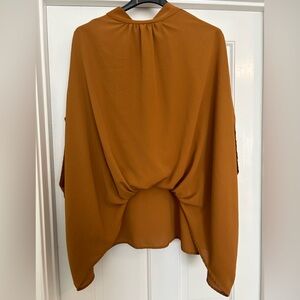 Bronze colored blouse. Oversized very chic fit